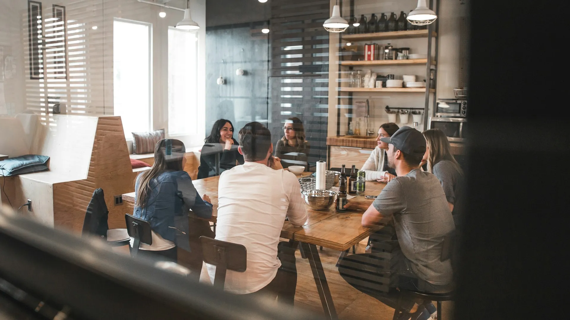 Team discussing ideas and collaborating during a workplace meeting